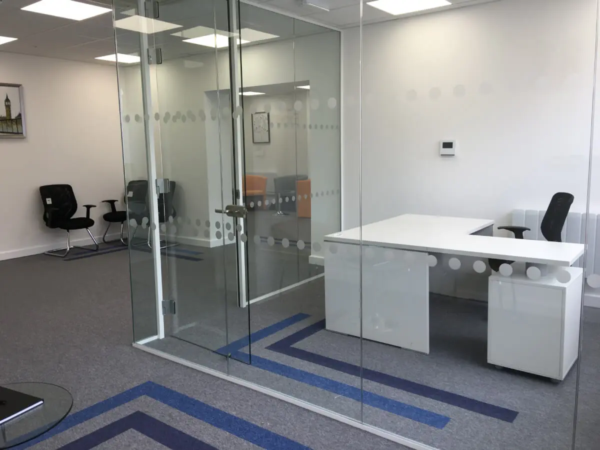 Office space glass partitions and designer floor