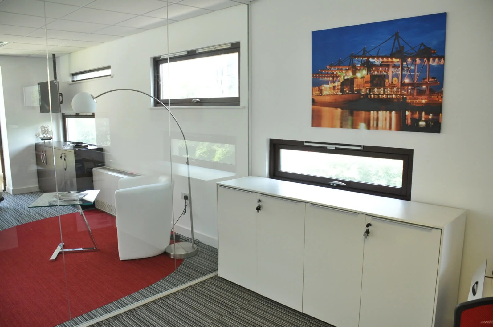 Unimines office space with designer furnitures and laminated wood flooring and suspended grid ceiling and glass partitions screen 12 Unimines office space with designer furnitures and laminated wood flooring and suspended grid ceiling and glass partitions screen 13