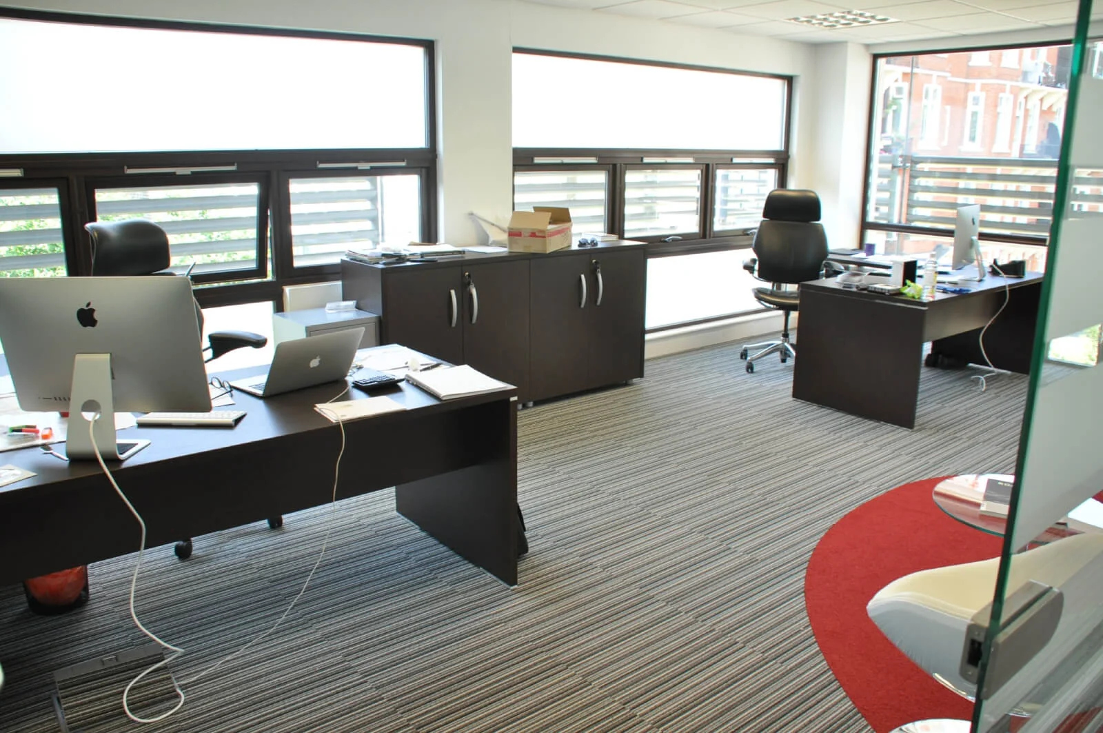 Unimines office space with designer furnitures and laminated wood flooring and suspended grid ceiling and glass partitions screen 15 Unimines office space with designer furnitures and laminated wood flooring and suspended grid ceiling and glass partitions screen 16