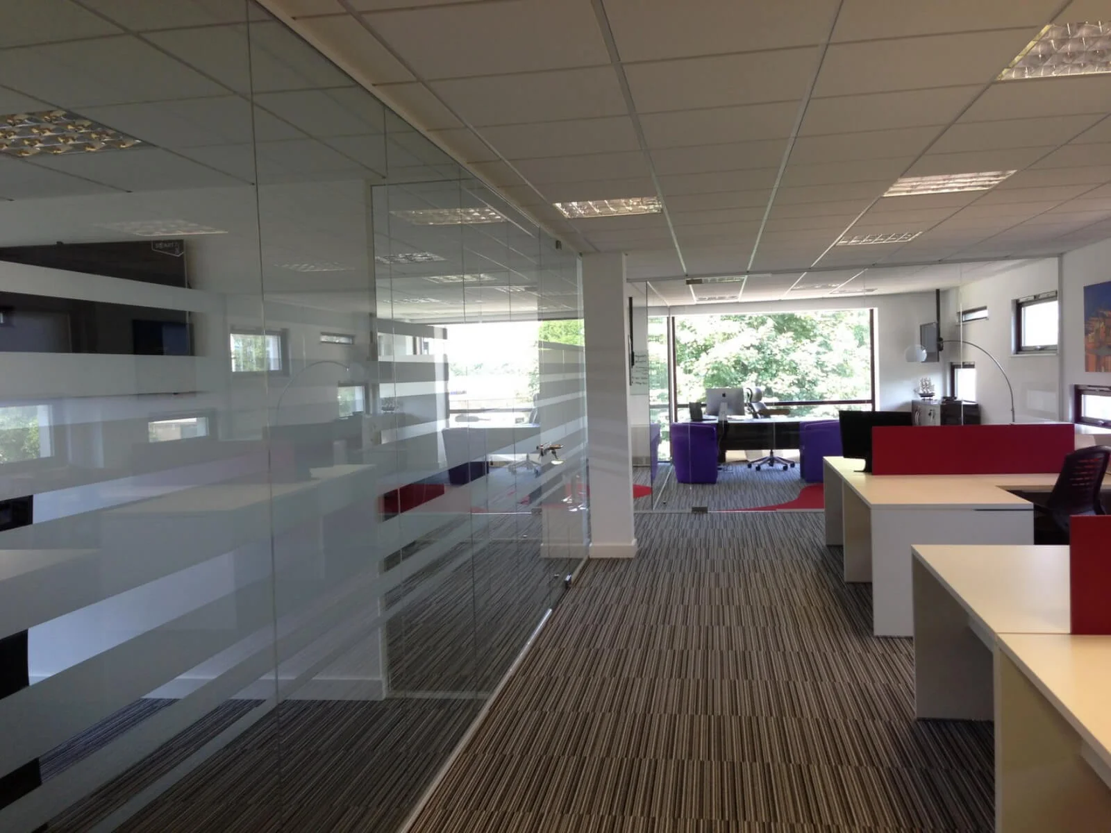Unimines office space with designer furnitures and laminated wood flooring and suspended grid ceiling and glass partitions screen 19 Unimines office space with designer furnitures and laminated wood flooring and suspended grid ceiling and glass partitions screen 20