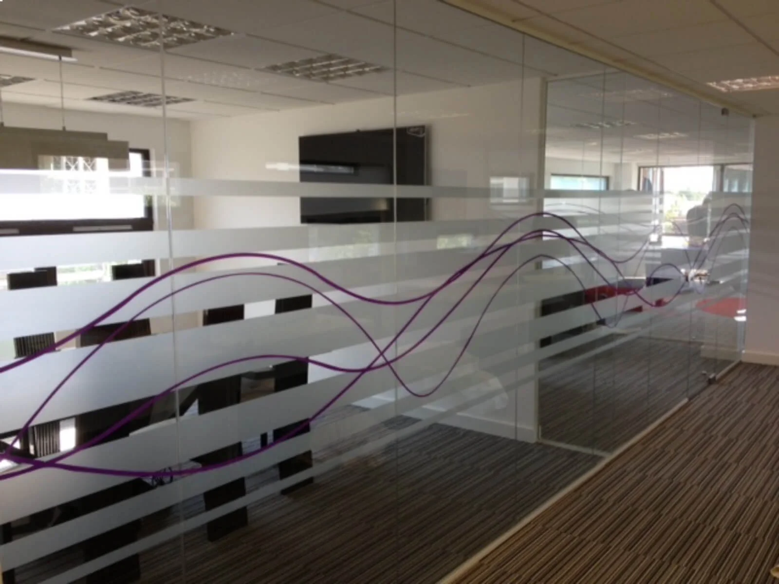 Unimines office space with designer furnitures and laminated wood flooring and suspended grid ceiling and glass partitions screen 21 Unimines office space with designer furnitures and laminated wood flooring and suspended grid ceiling and glass partitions screen 22