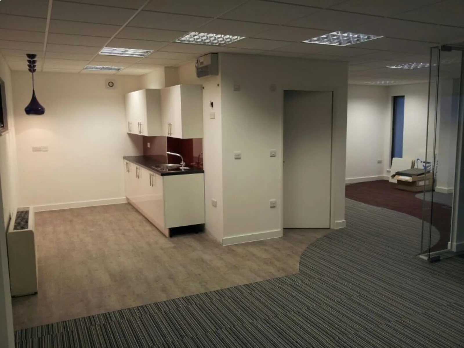 Unimines office space with designer furnitures and laminated wood flooring and suspended grid ceiling and glass partitions screen 28 Unimines office space with designer furnitures and laminated wood flooring and suspended grid ceiling and glass partitions screen 28