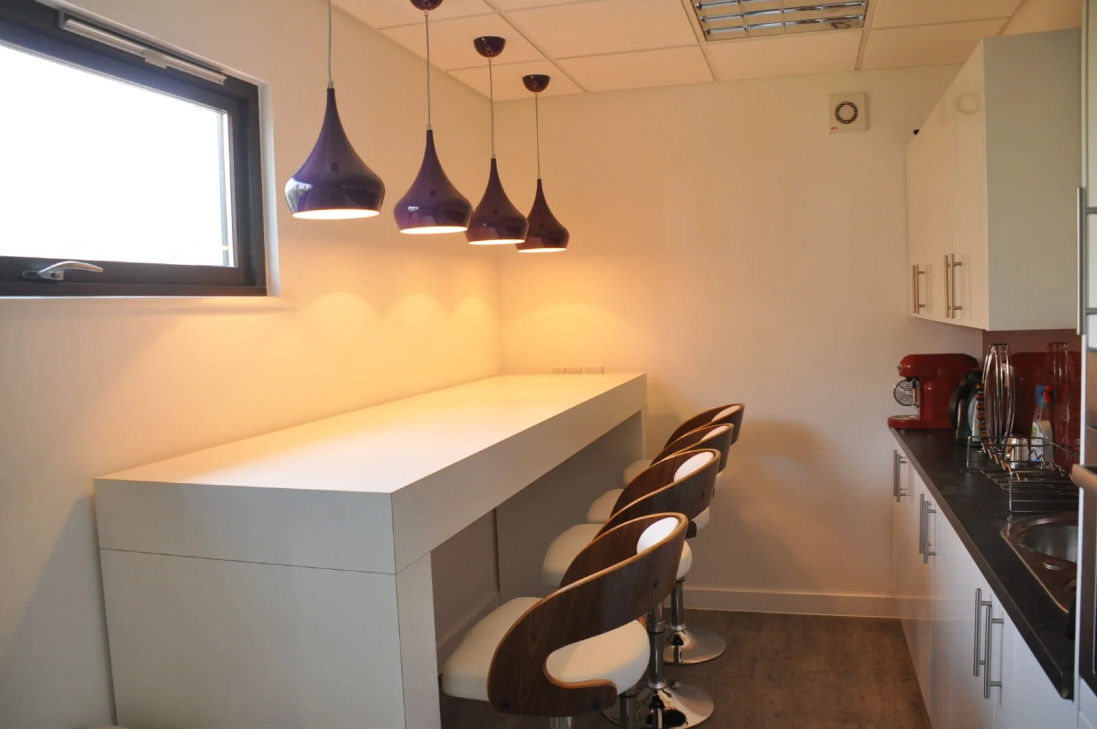 Unimines office space with designer furnitures and laminated wood flooring and suspended grid ceiling and glass partitions screen 3 Unimines office space with designer furnitures and laminated wood flooring and suspended grid ceiling and glass partitions screen 3