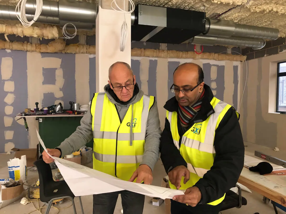 GXI team discussion during Office Refurbishment & Fit Out