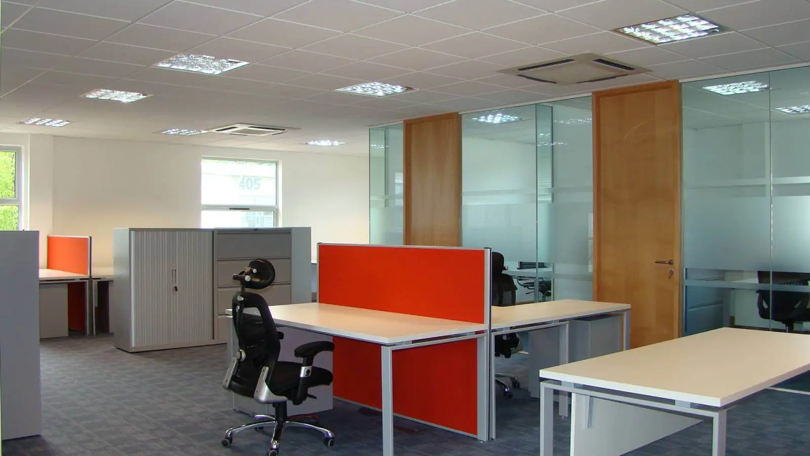 Brightstone Law firm with designer furniture, suspended grid ceiling, carpet tile flooring and glass partitions