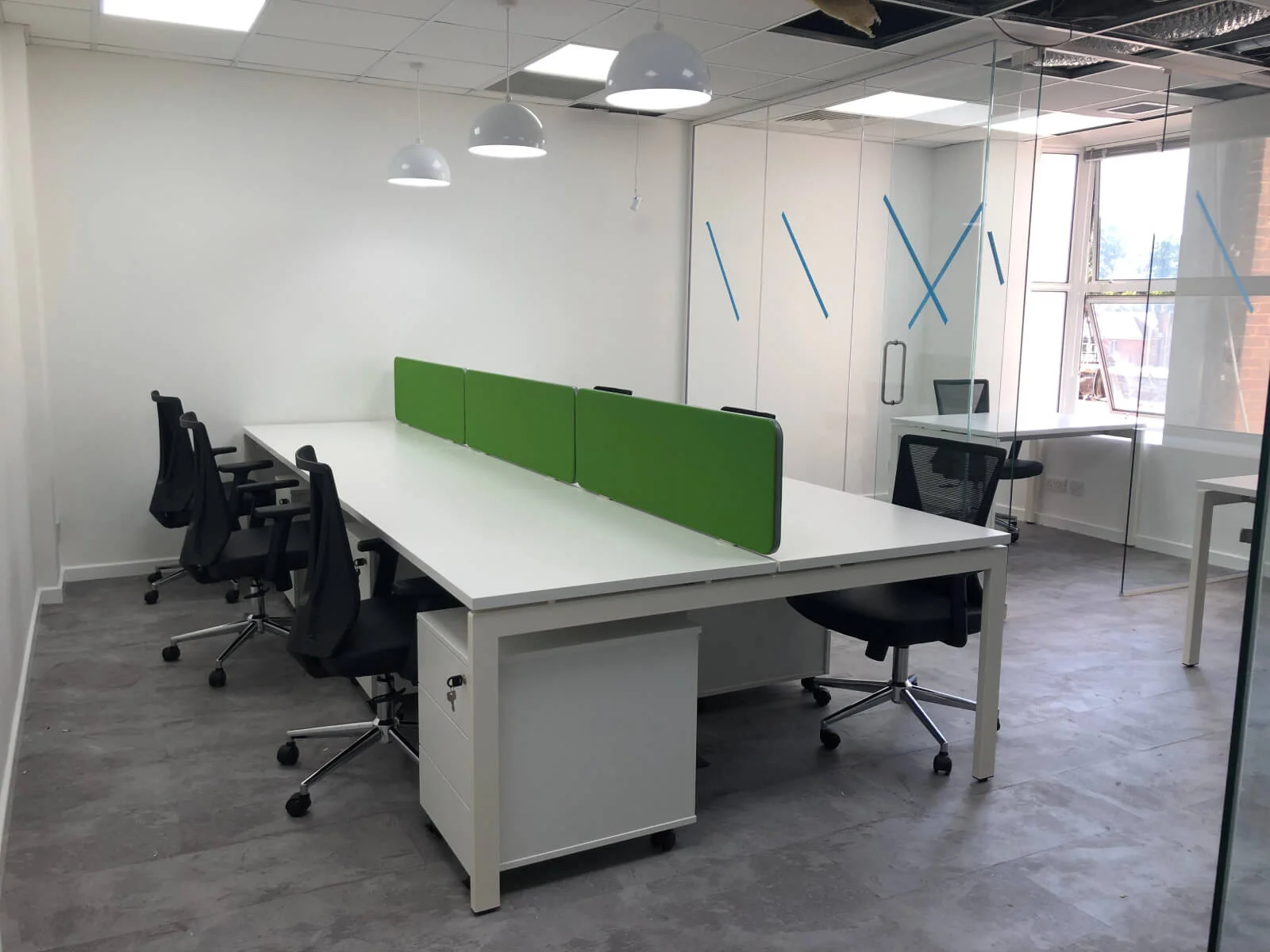 Buckingham Futures office with single glazed with frameless doors glass partitions and desinger furniture
