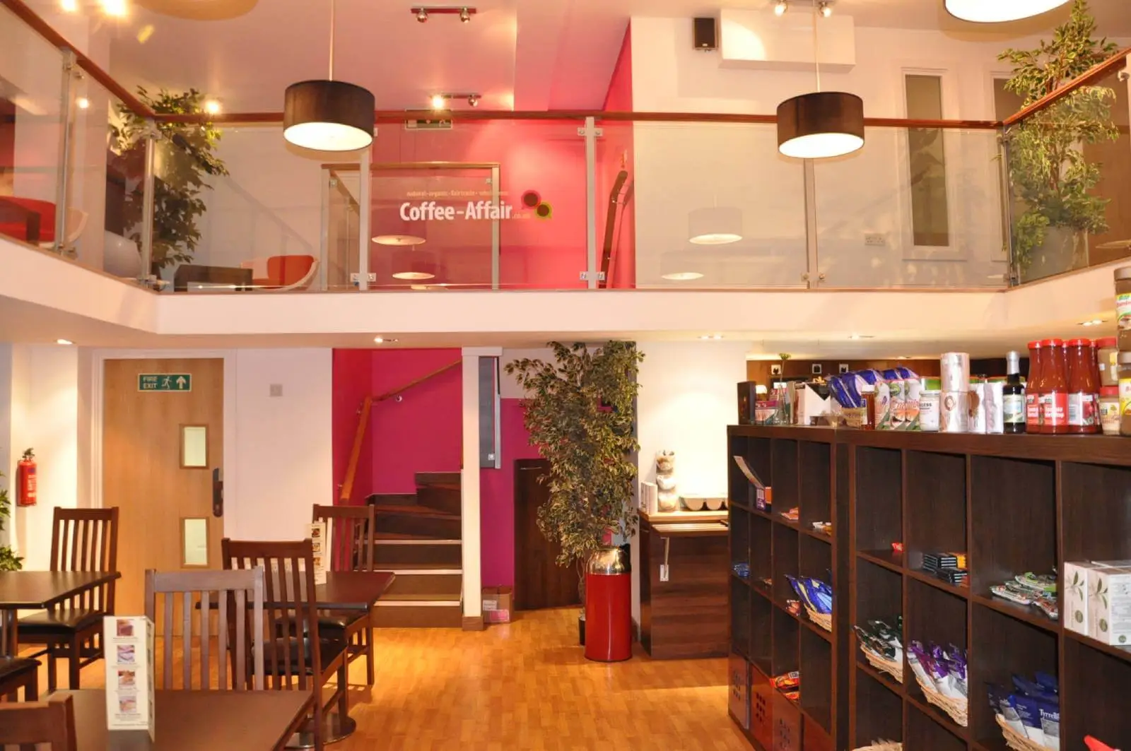 Coffee Affair space with designer furniture, laminated wood floor, plasterboard ceiling