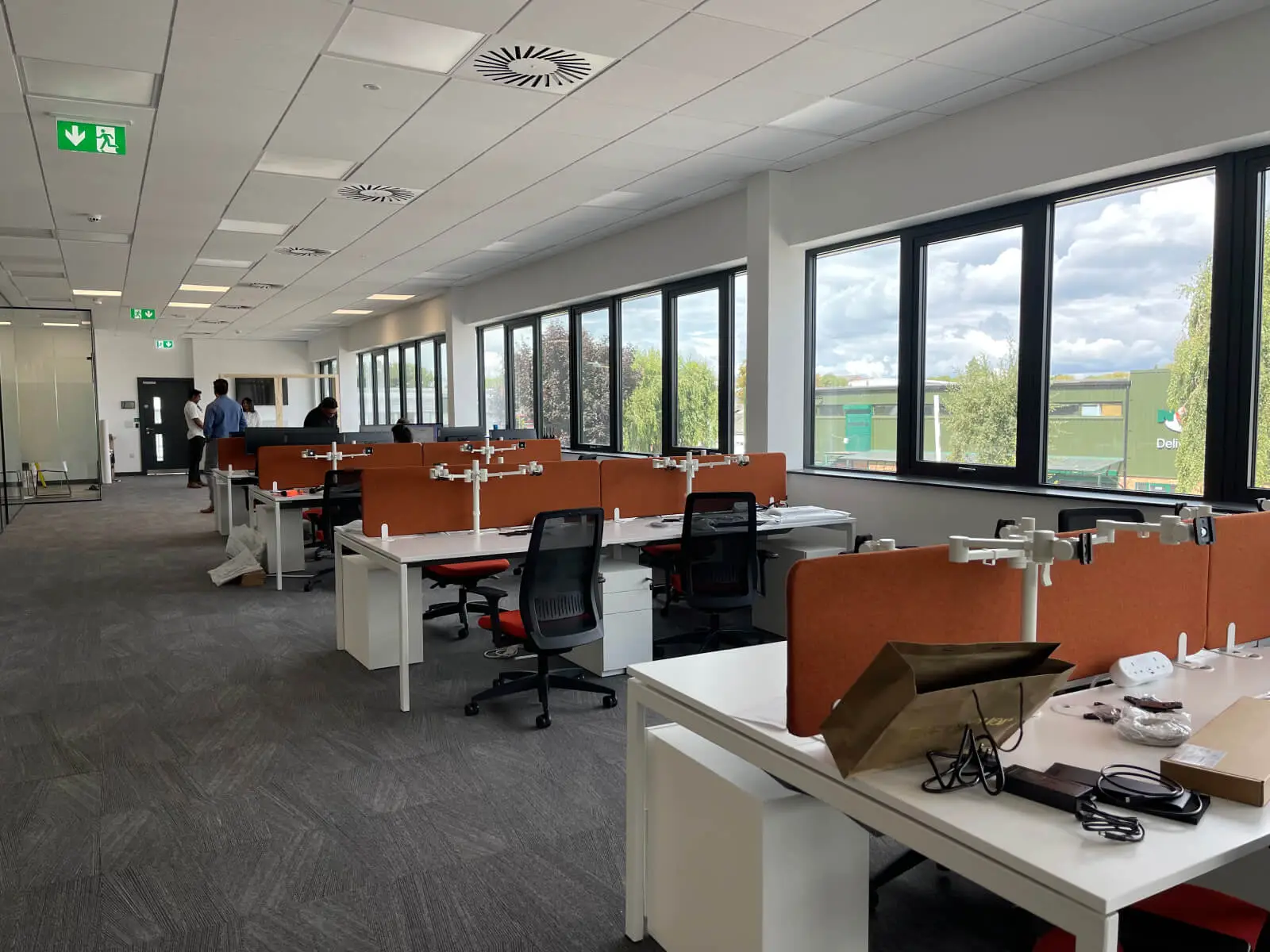 Vanilla Bazaar office space with designer furniture, laminated wood flooring, ceiling and glass partitions