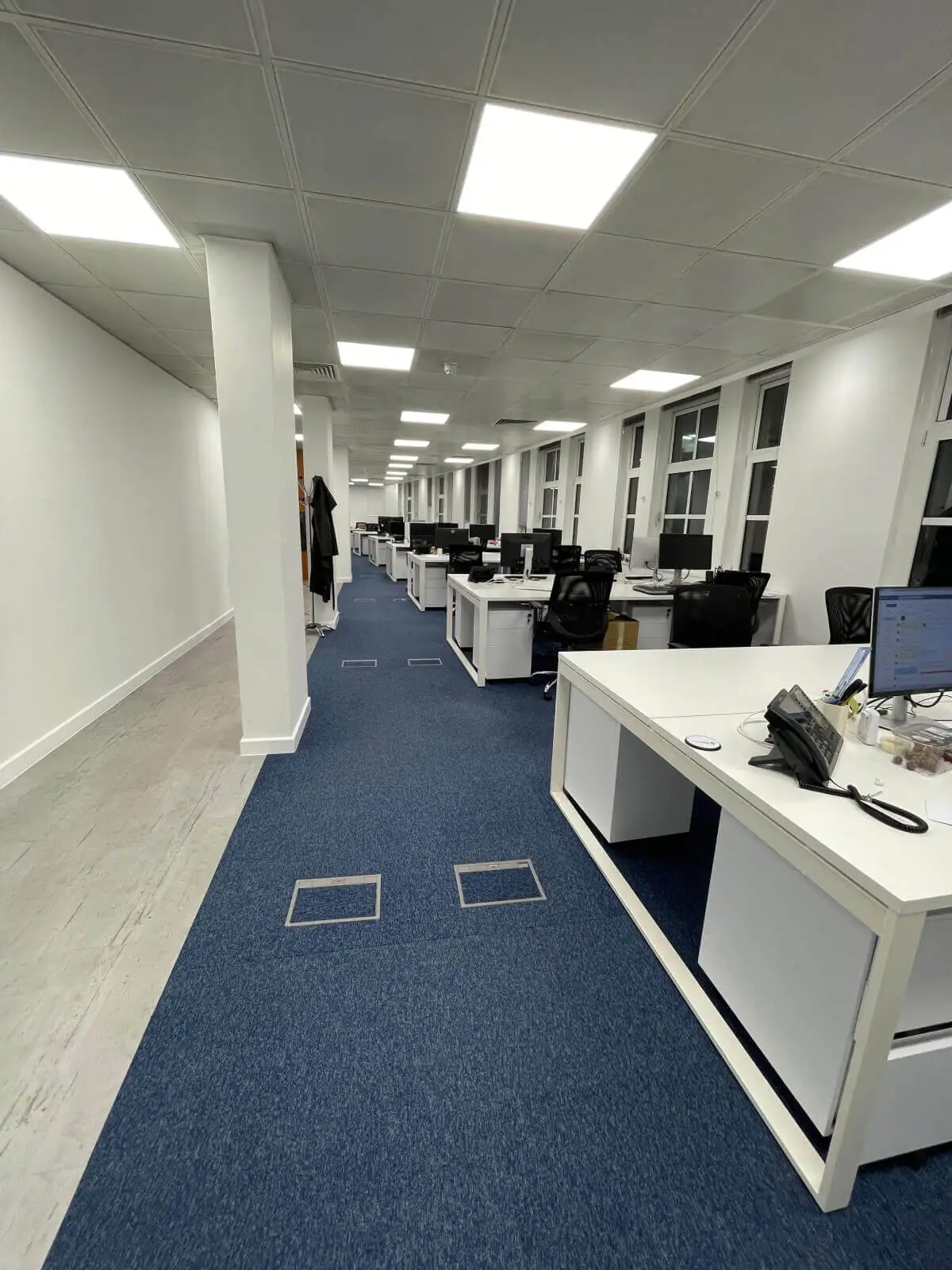 Gracechurch Group office space with designer flooring, ceiling and furniture