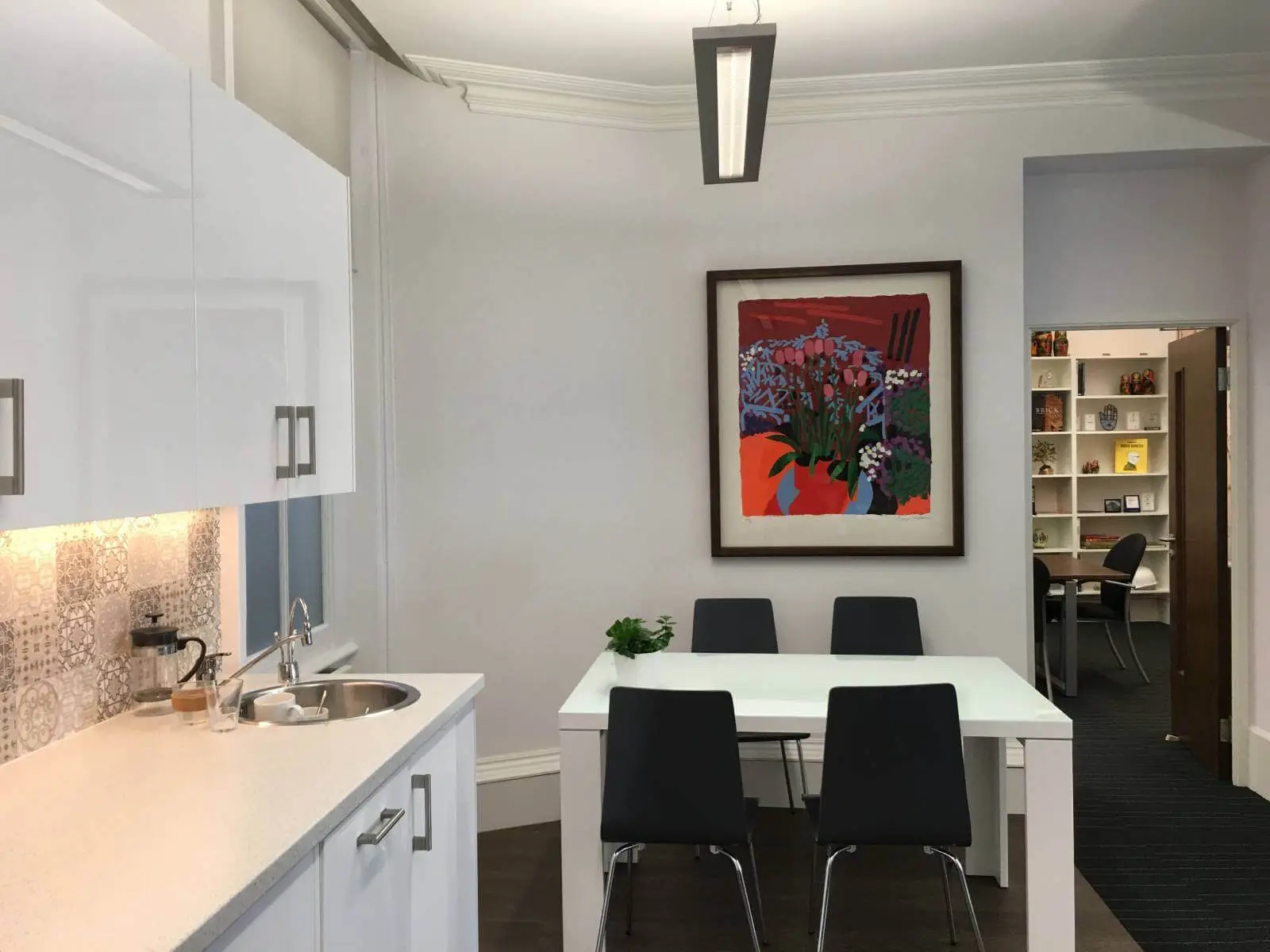 Hill View Regents Street space with furniture, ceiling, flooring, and splash backs, and glass and solid wall partitions