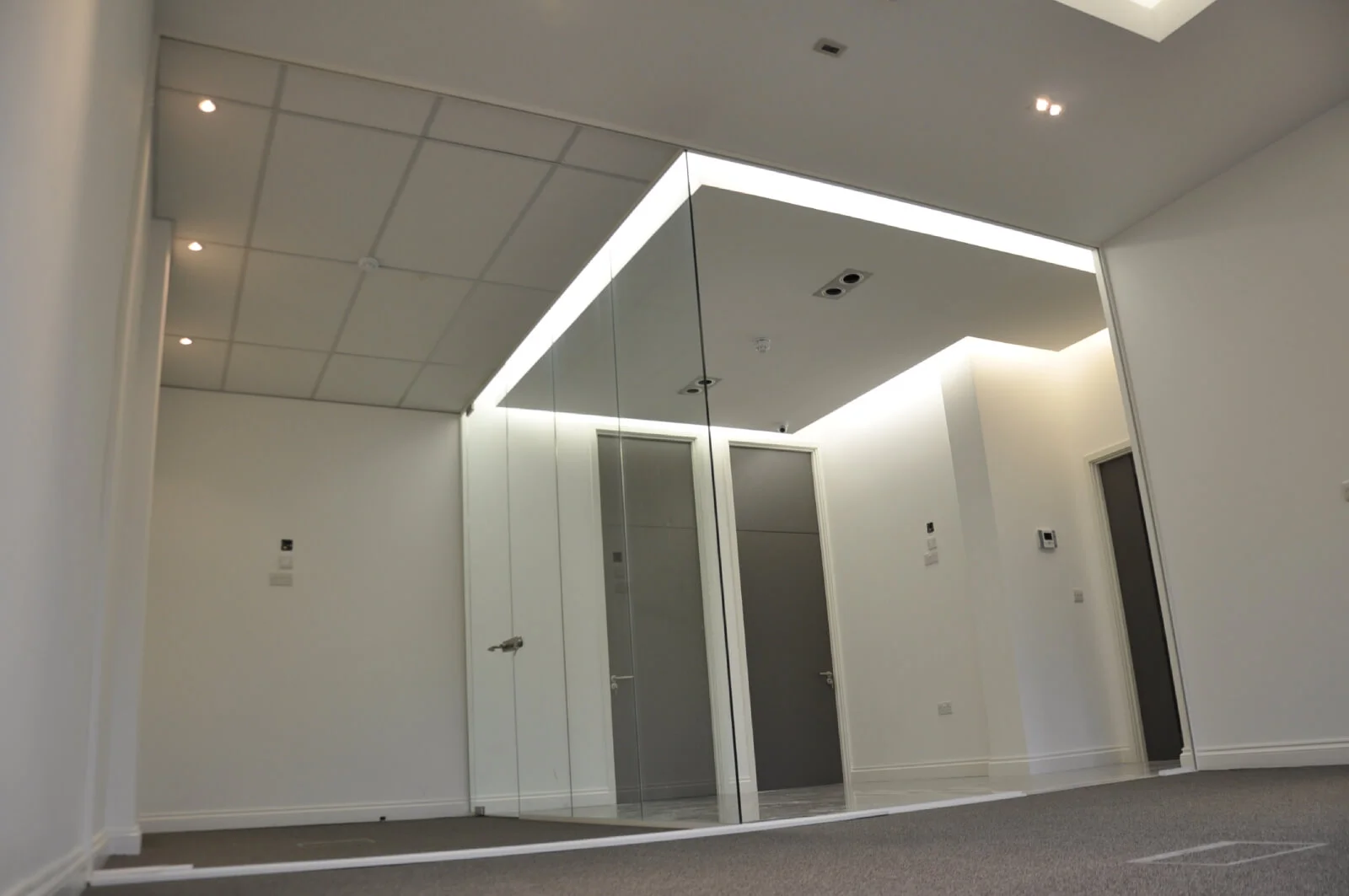 world sim office space with designer furnitures and Carpet tile flooring and suspended grid ceiling and glass partitions screen