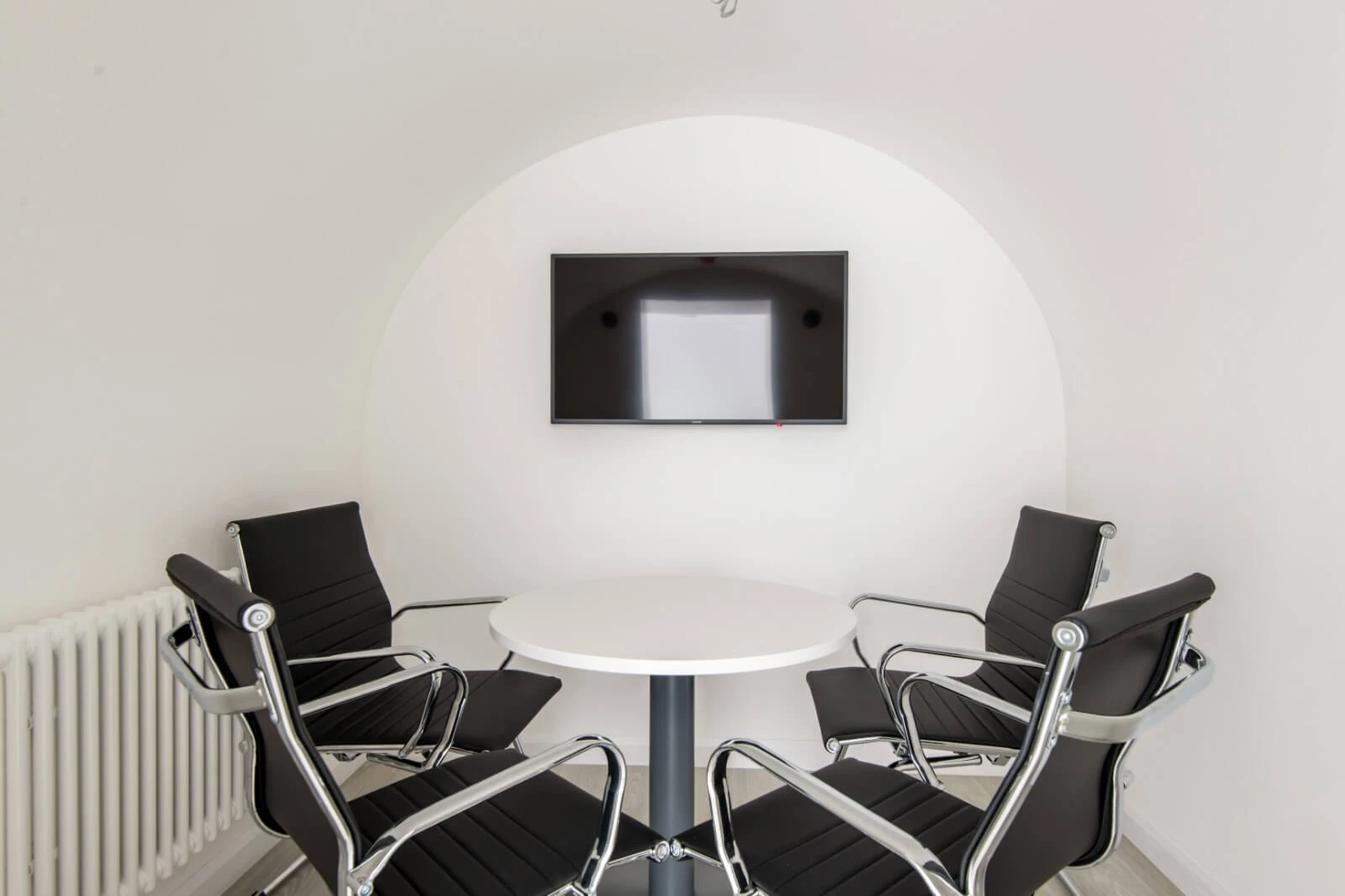 Able Prop office design with designer back to back desks with screens and chairs 12