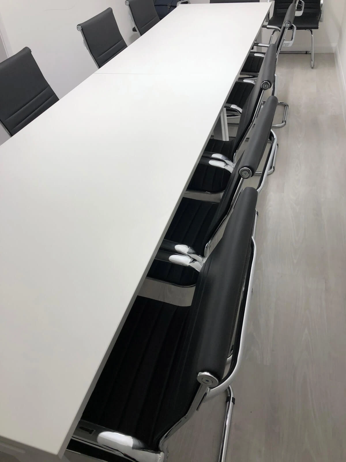 Able Prop office design with designer back to back desks with screens and chairs 5