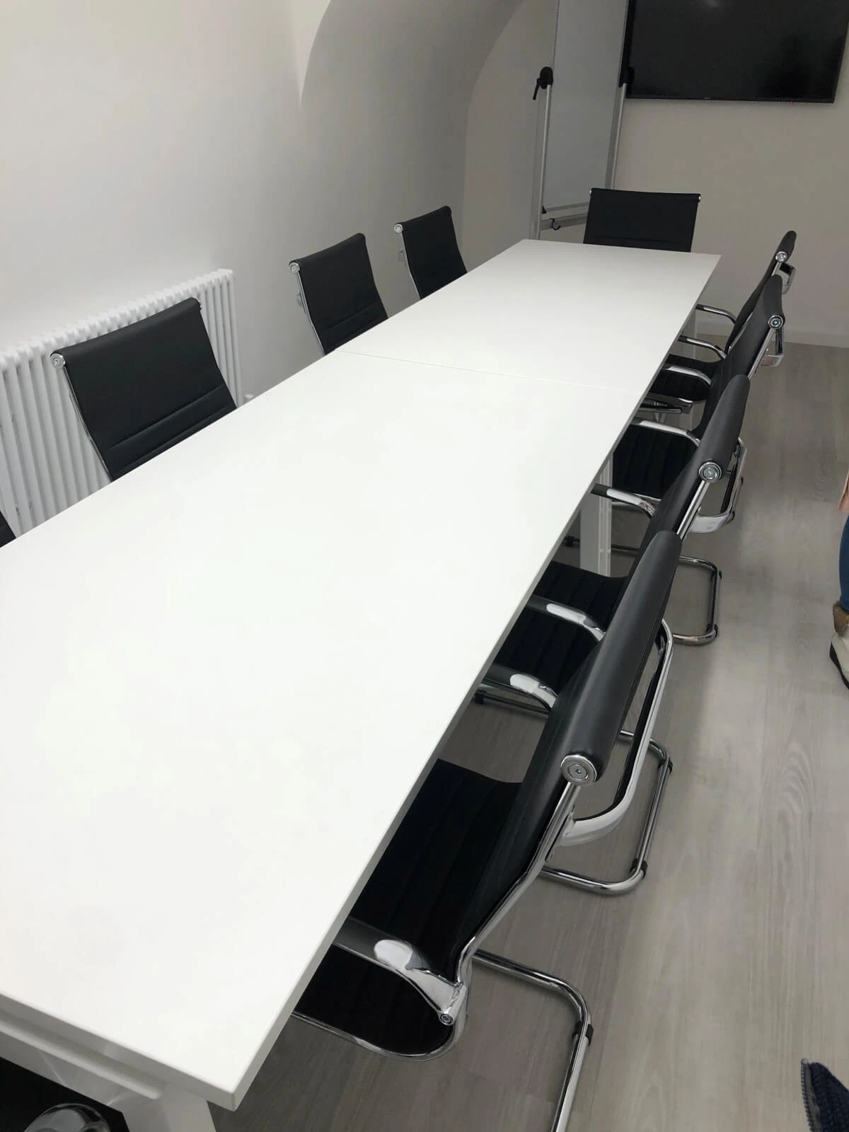 Able Prop office design with designer back to back desks with screens and chairs 6