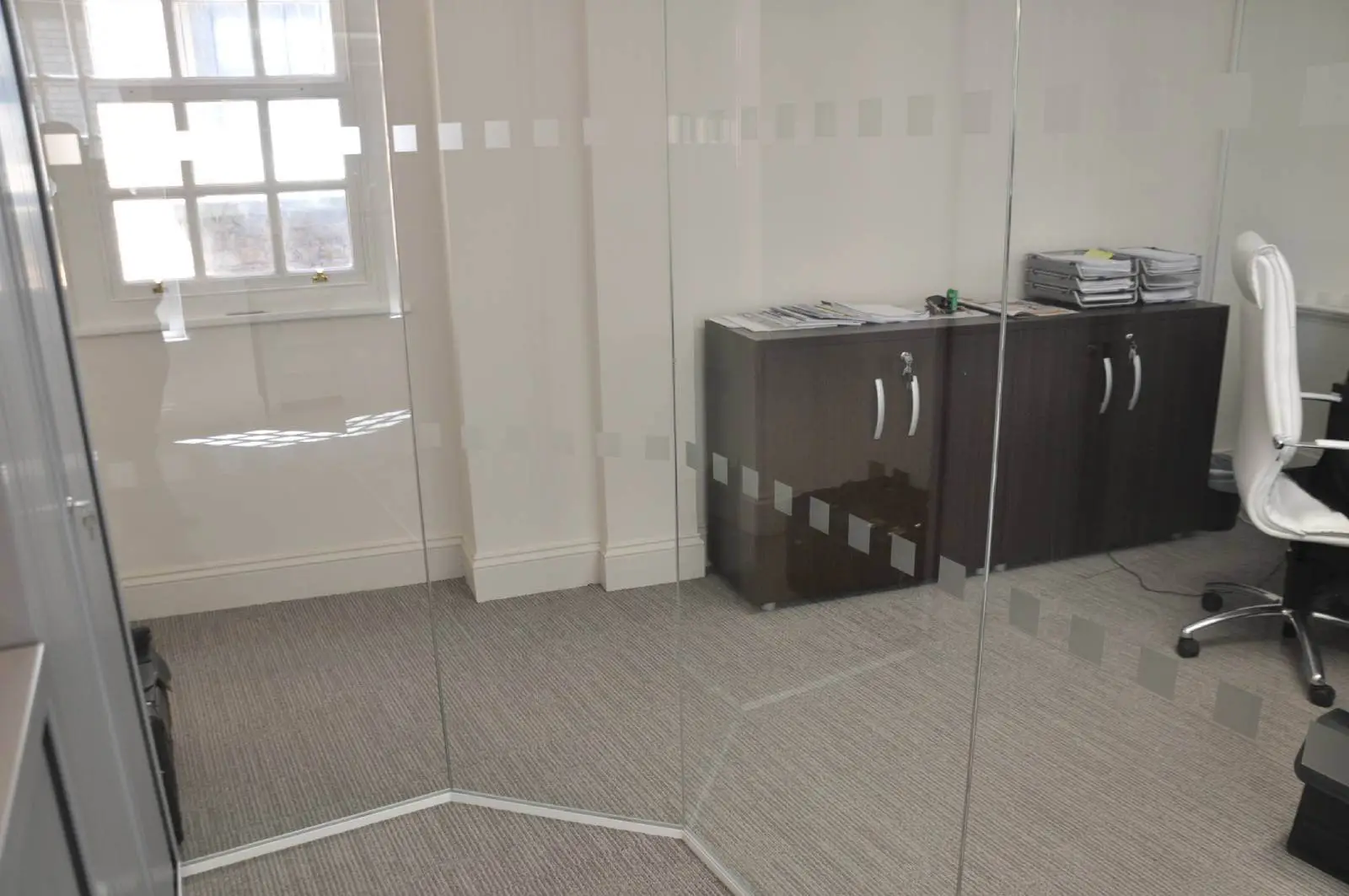 Aprirose-office-space-with-designer-furniture,-plasterboard-ceiling,-laminated-wood-flooring-and-glass-partitions 12