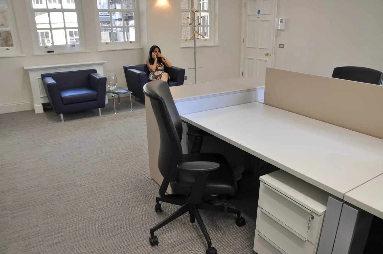 Aprirose-office-space-with-designer-furniture,-plasterboard-ceiling,-laminated-wood-flooring-and-glass-partitions 15