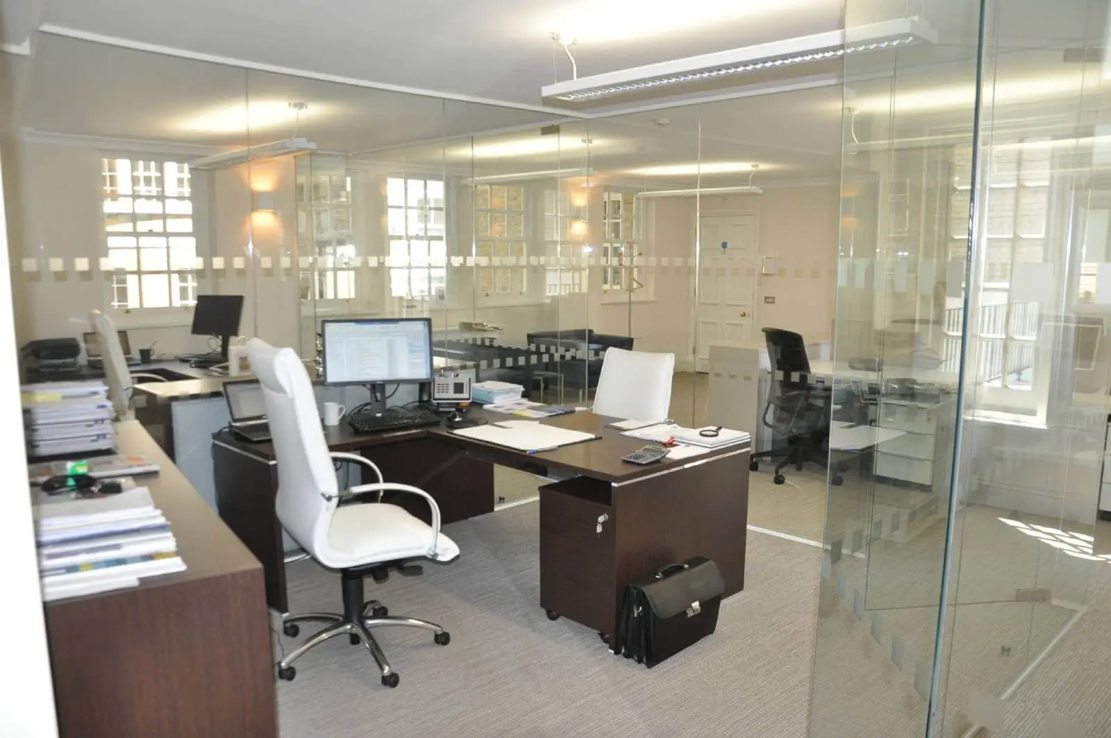 Aprirose-office-space-with-designer-furniture,-plasterboard-ceiling,-laminated-wood-flooring-and-glass-partitions 18