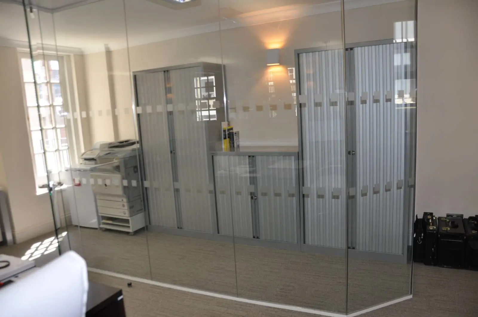 Aprirose-office-space-with-designer-furniture,-plasterboard-ceiling,-laminated-wood-flooring-and-glass-partitions 19