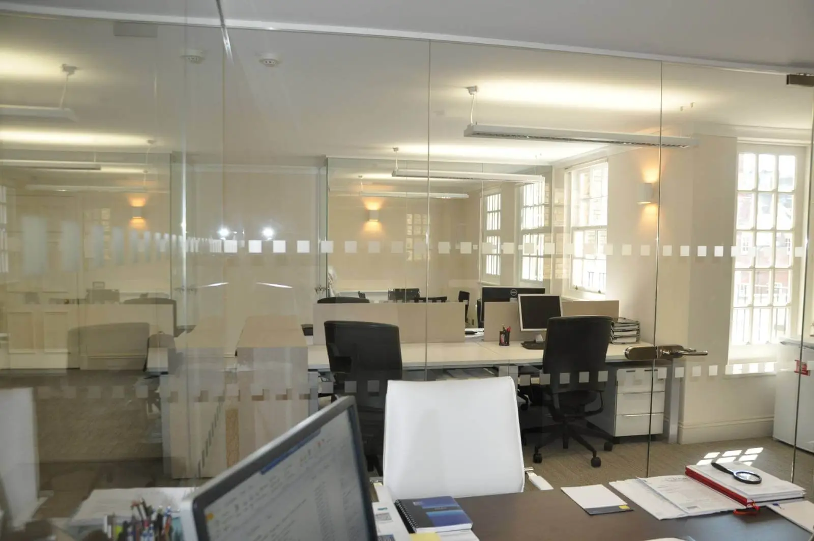Aprirose-office-space-with-designer-furniture,-plasterboard-ceiling,-laminated-wood-flooring-and-glass-partitions 21