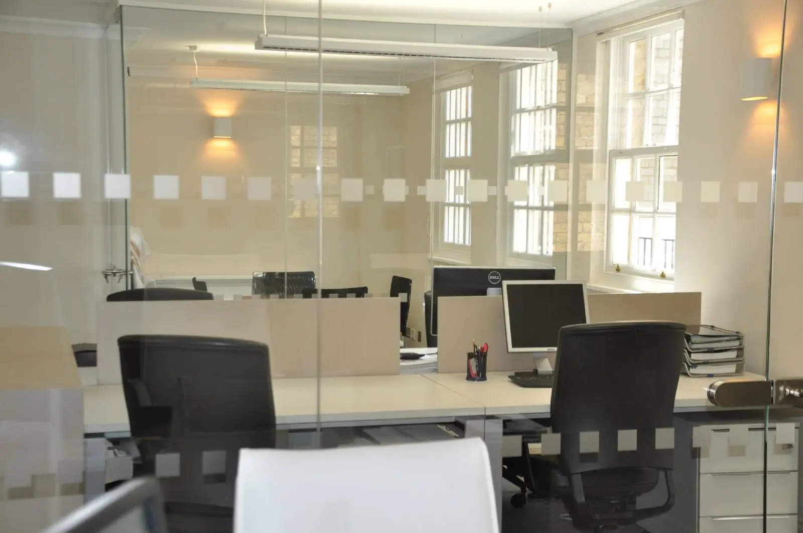 Aprirose-office-space-with-designer-furniture,-plasterboard-ceiling,-laminated-wood-flooring-and-glass-partitions 22