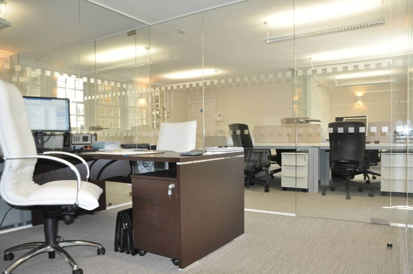 Aprirose-office-space-with-designer-furniture,-plasterboard-ceiling,-laminated-wood-flooring-and-glass-partitions 23