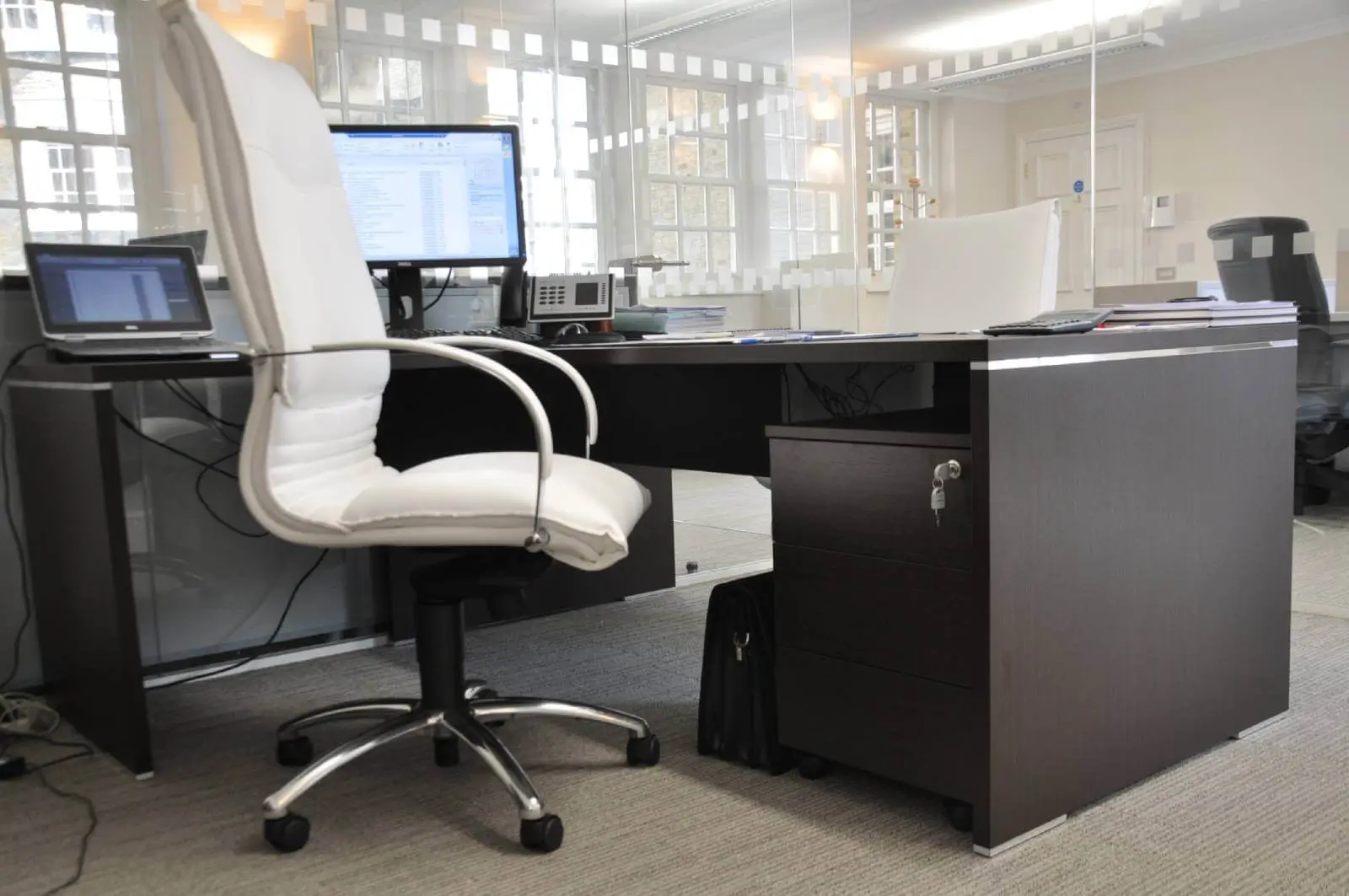 Aprirose-office-space-with-designer-furniture,-plasterboard-ceiling,-laminated-wood-flooring-and-glass-partitions 24