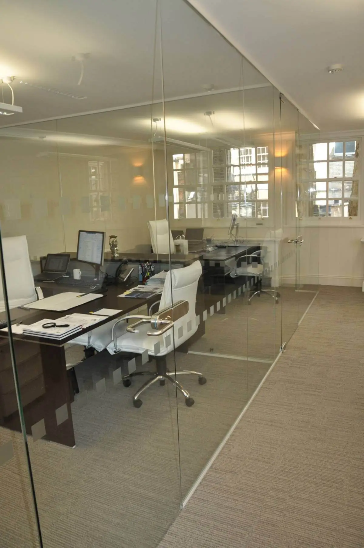 Aprirose-office-space-with-designer-furniture,-plasterboard-ceiling,-laminated-wood-flooring-and-glass-partitions 26