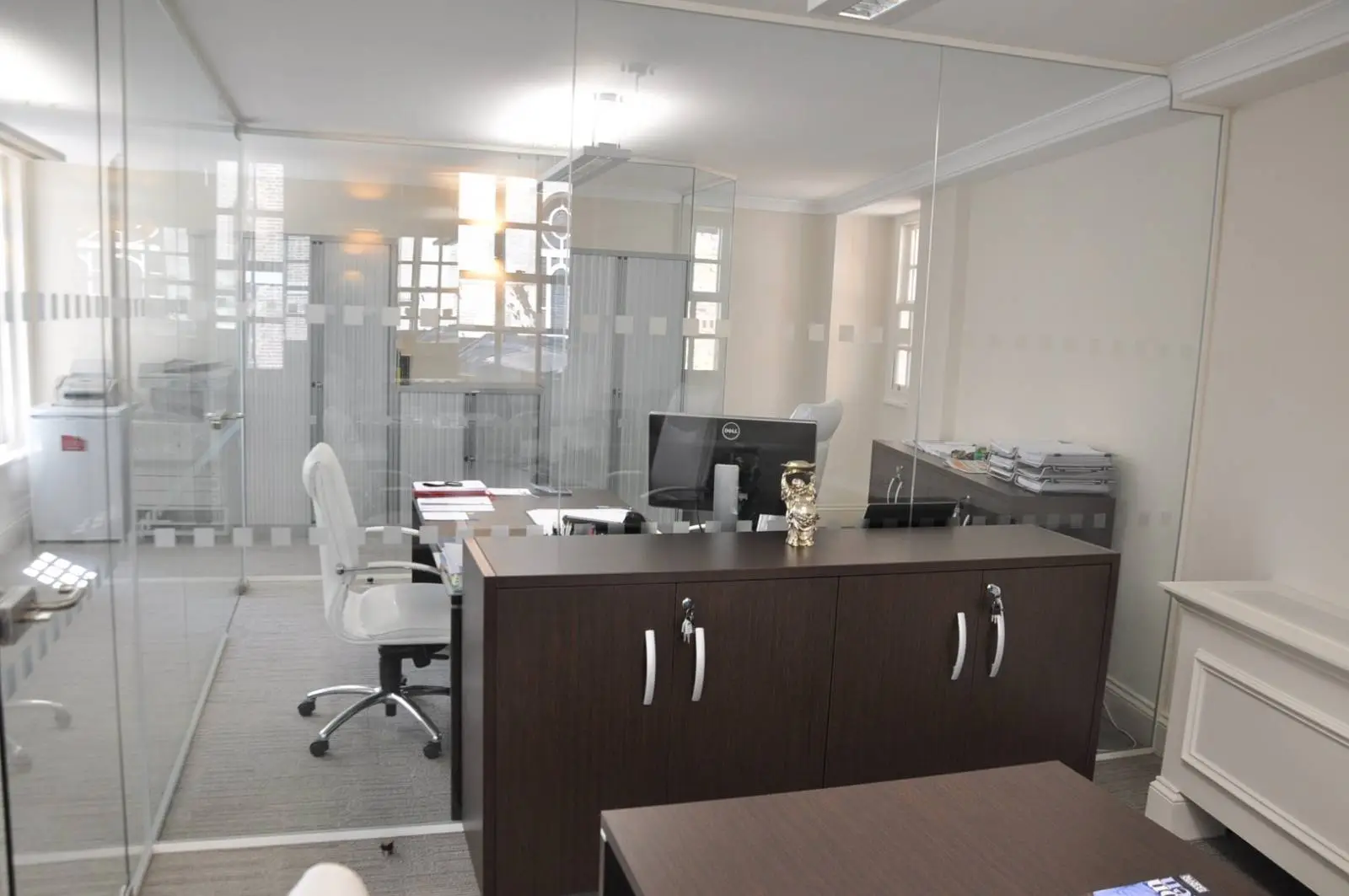 Aprirose-office-space-with-designer-furniture,-plasterboard-ceiling,-laminated-wood-flooring-and-glass-partitions 31