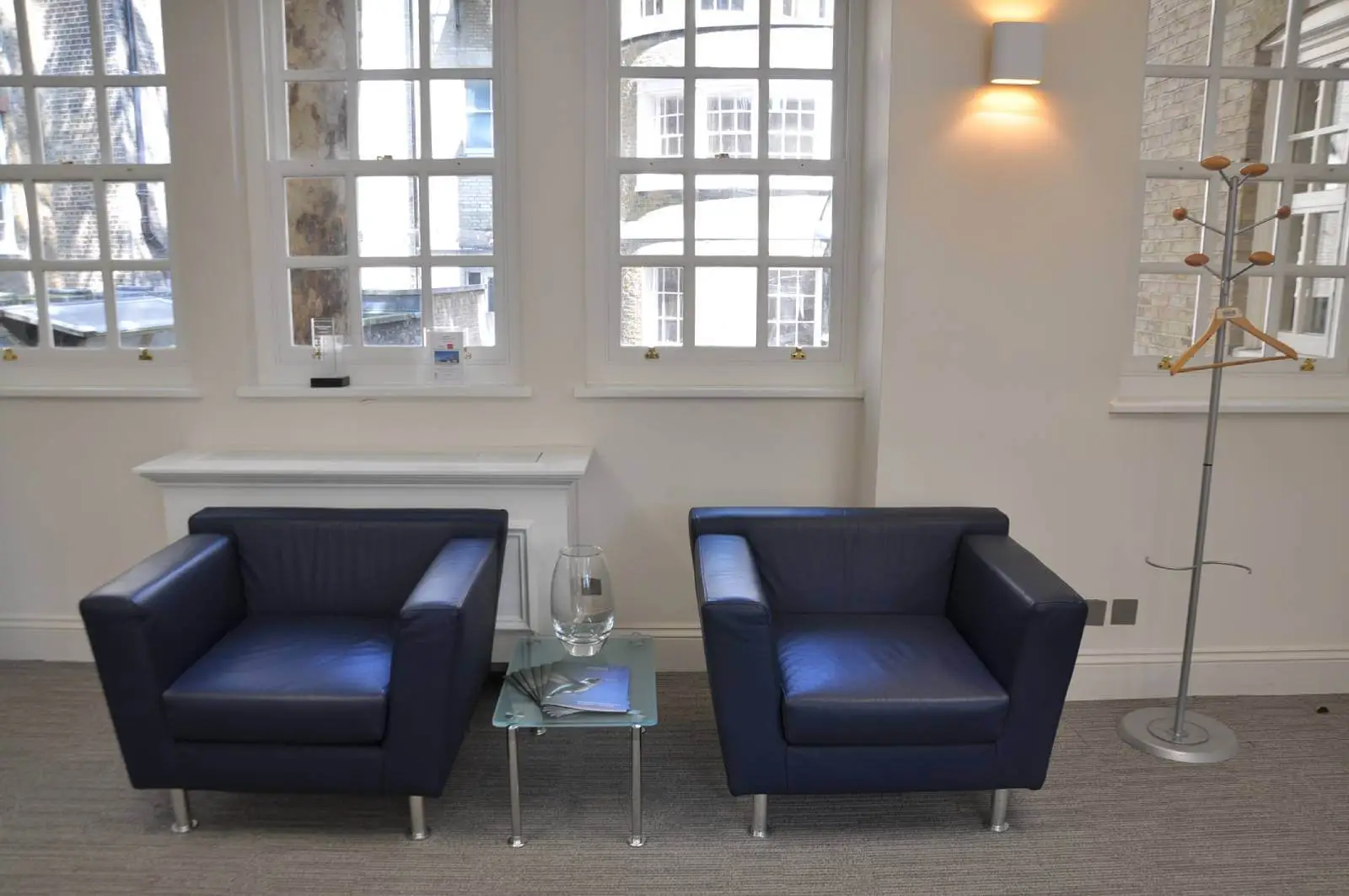 Aprirose-office-space-with-designer-furniture,-plasterboard-ceiling,-laminated-wood-flooring-and-glass-partitions 33