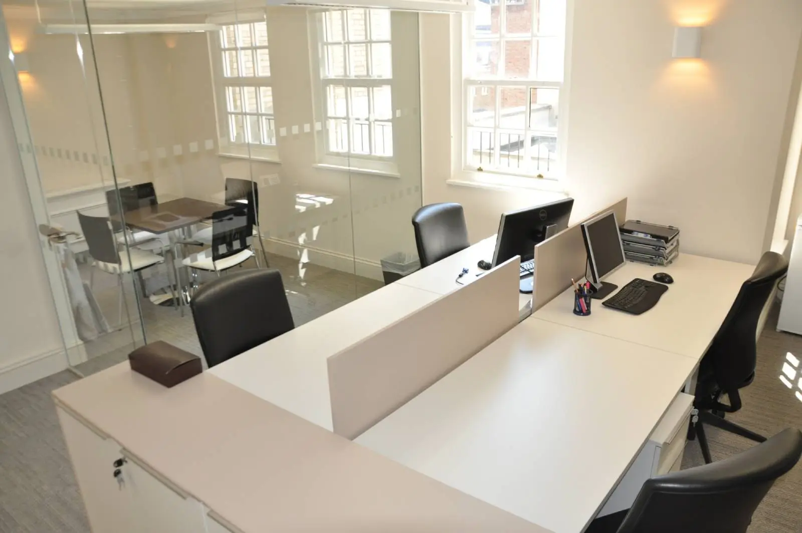 Aprirose-office-space-with-designer-furniture,-plasterboard-ceiling,-laminated-wood-flooring-and-glass-partitions 34