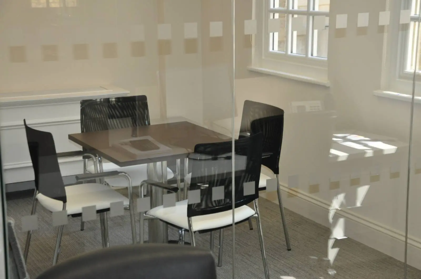 Aprirose-office-space-with-designer-furniture,-plasterboard-ceiling,-laminated-wood-flooring-and-glass-partitions 35