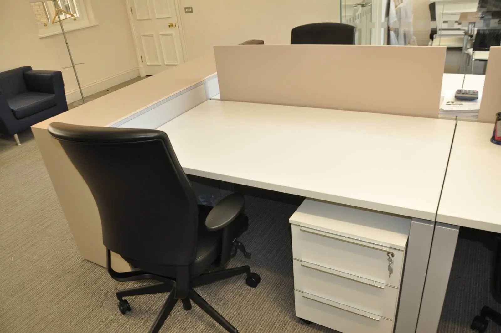 Aprirose-office-space-with-designer-furniture,-plasterboard-ceiling,-laminated-wood-flooring-and-glass-partitions 37