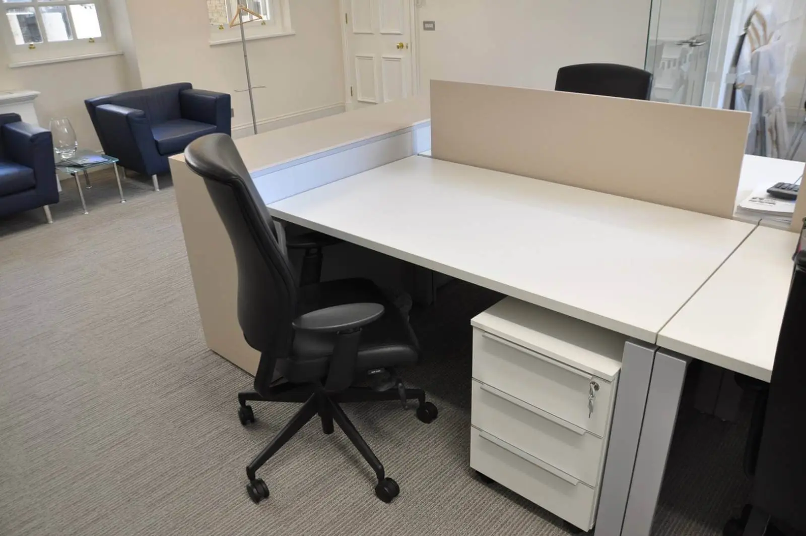 Aprirose-office-space-with-designer-furniture,-plasterboard-ceiling,-laminated-wood-flooring-and-glass-partitions 9