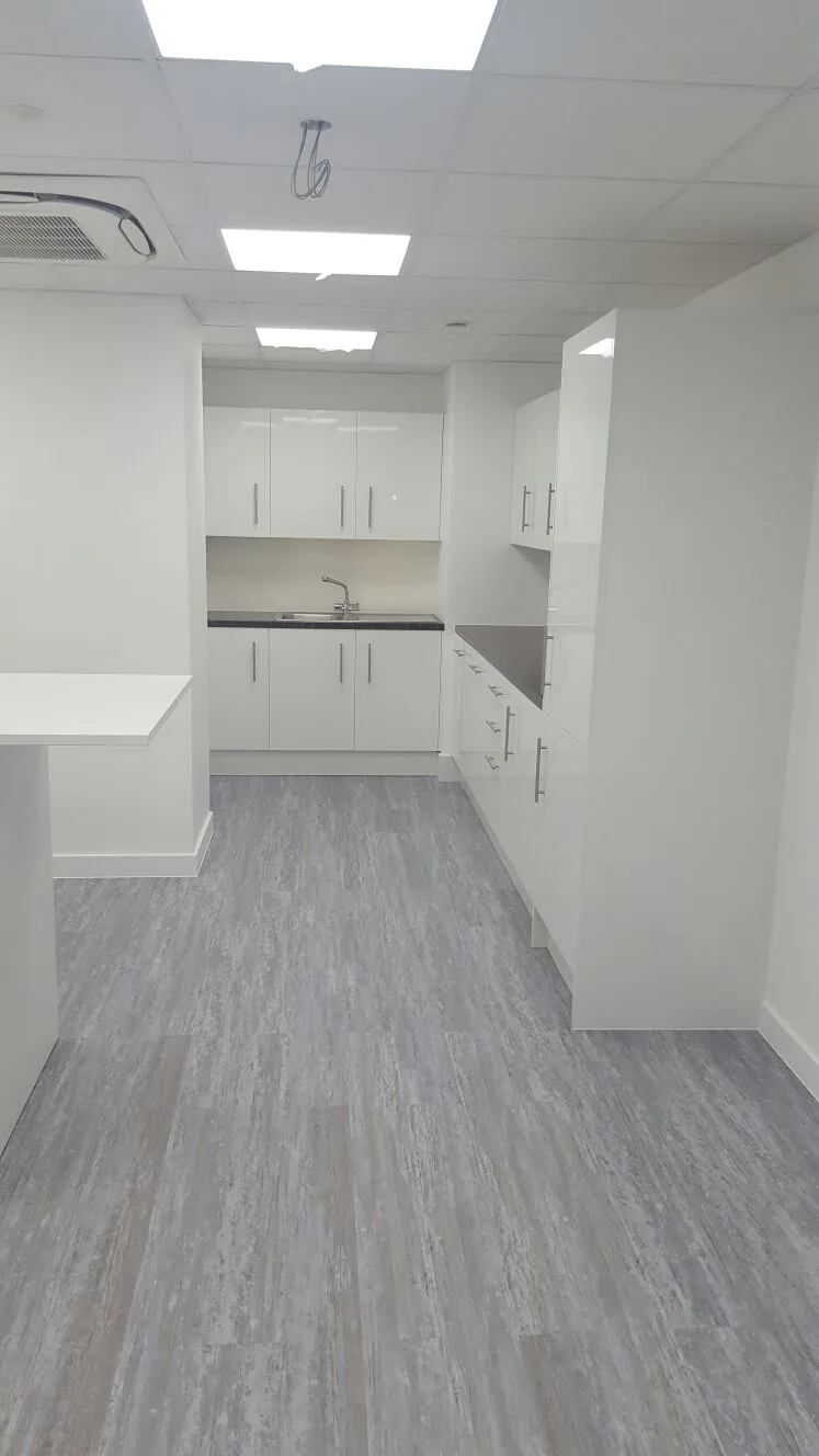 Beat Concept office space with designer back to back office desks, chiars and suspended grid ceiling 8