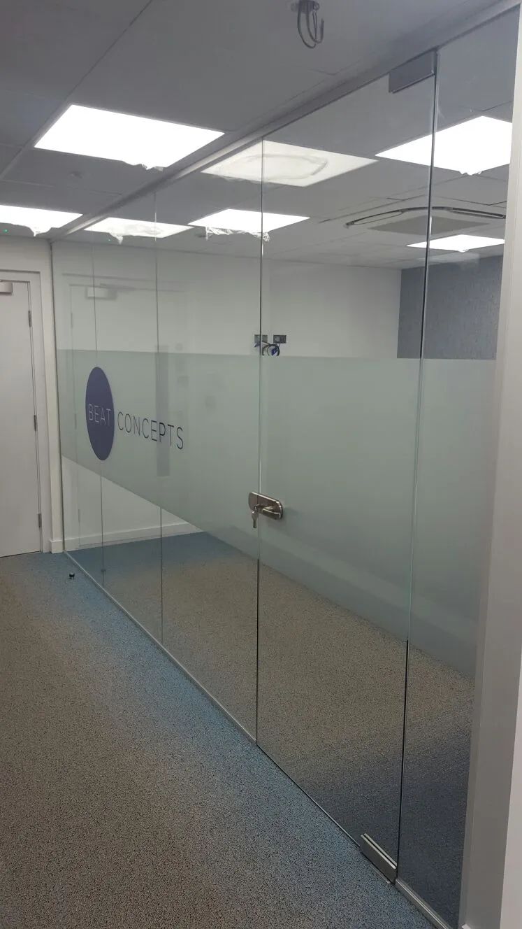 Beat Concept office space with designer back to back office desks, chiars and suspended grid ceiling 9