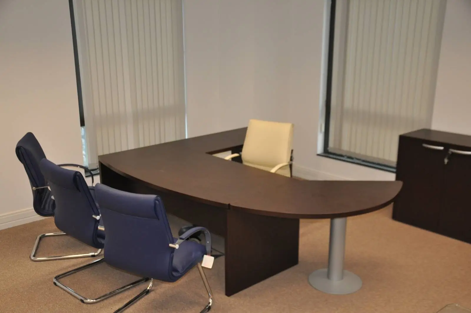 Bordeux office space with designer furniture, laminated wood floor, suspended grid ceiling, and glass partitions 11