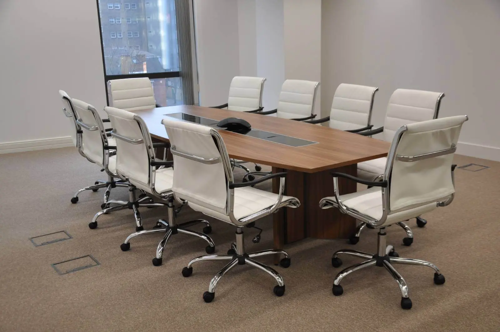 Bordeux office space with designer furniture, laminated wood floor, suspended grid ceiling, and glass partitions 17