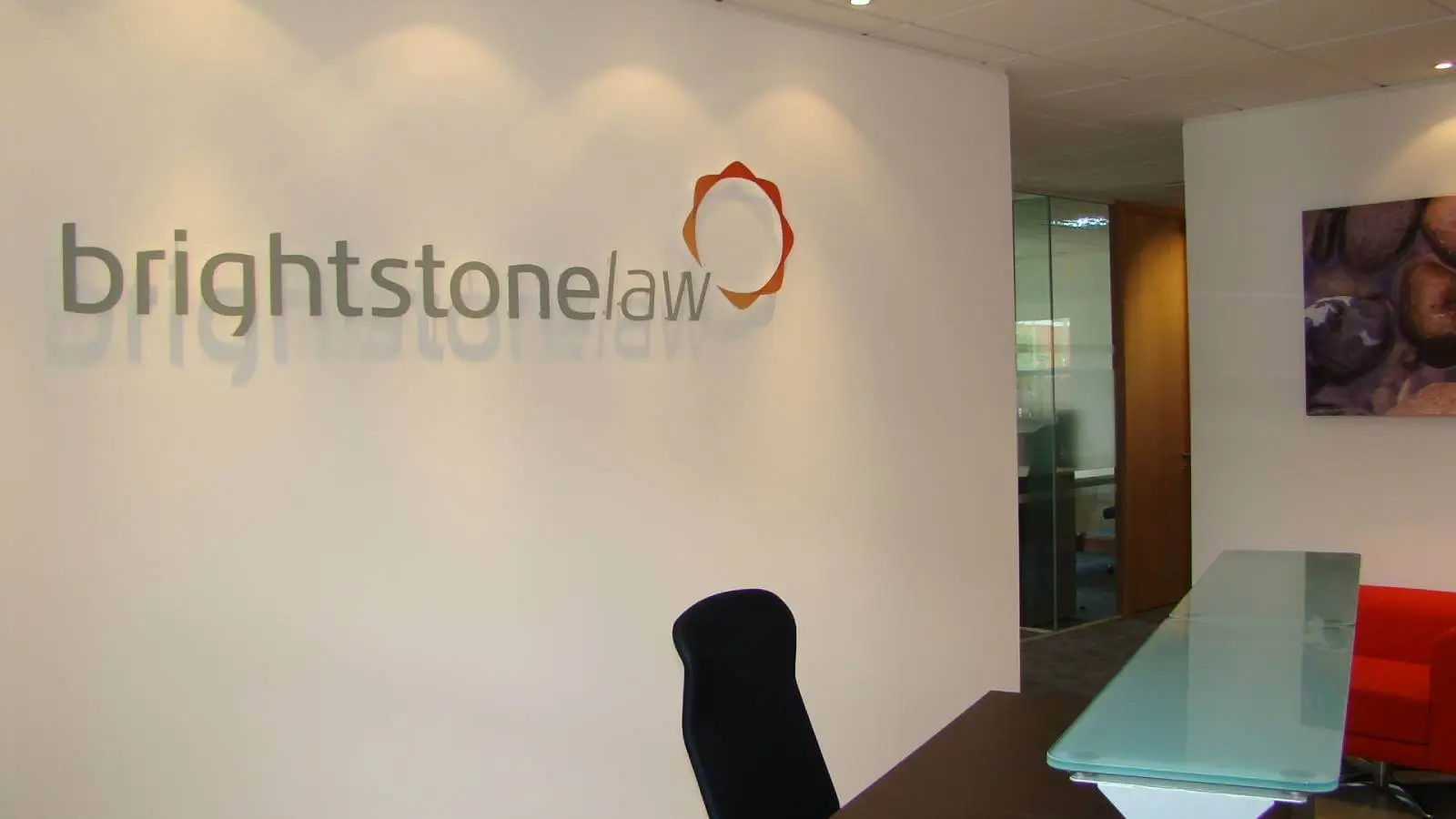 Brightstone Law firm with designer furniture, suspended grid ceiling, carpet tile flooring and glass partitions 10