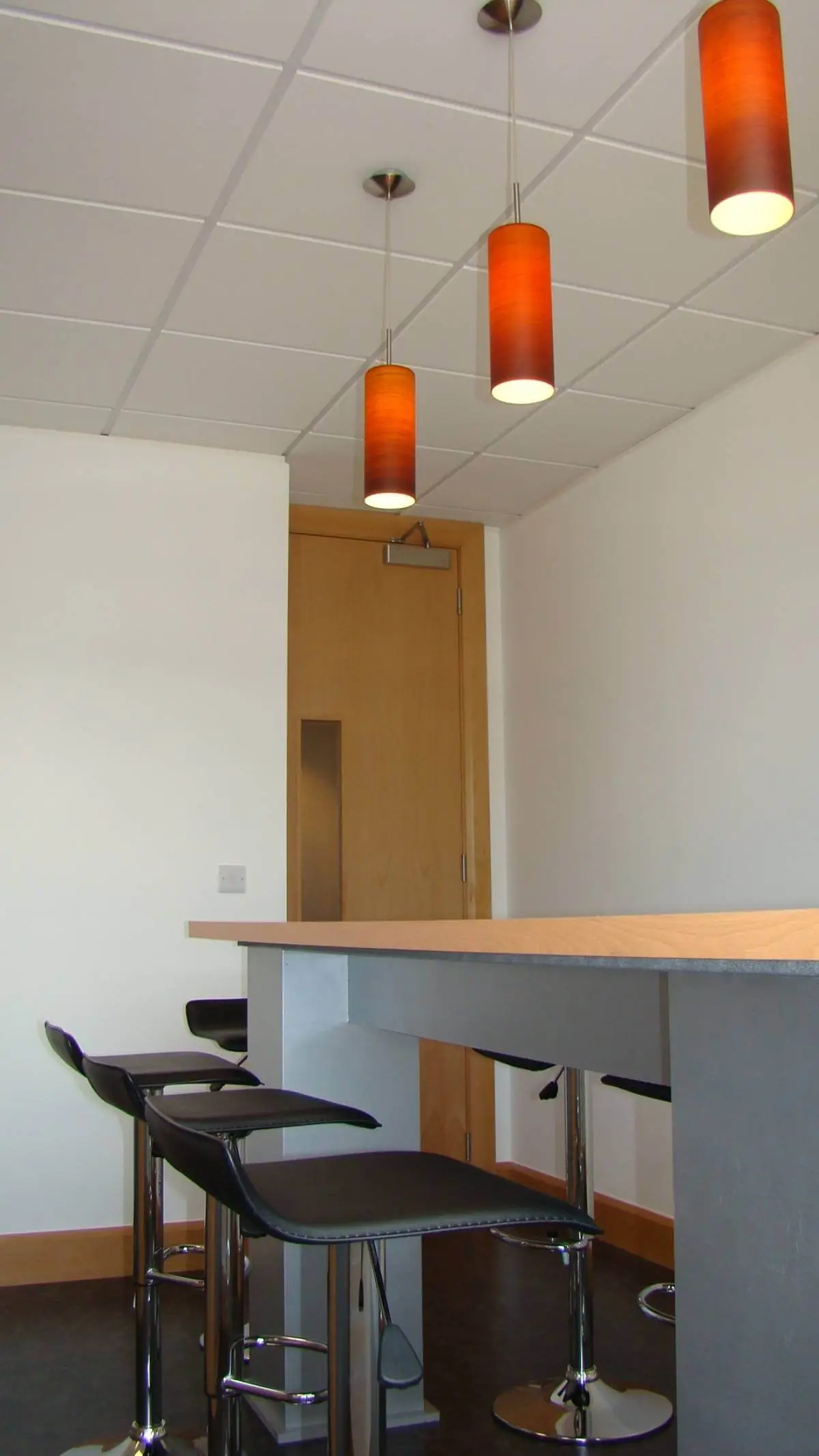 Brightstone Law firm with designer furniture, suspended grid ceiling, carpet tile flooring and glass partitions 12