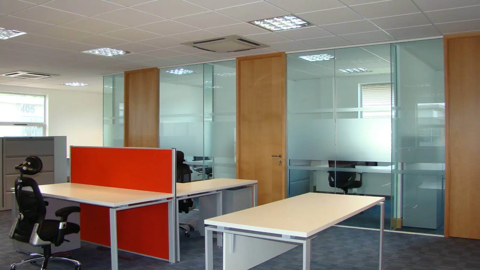 Brightstone Law firm with designer furniture, suspended grid ceiling, carpet tile flooring and glass partitions 5