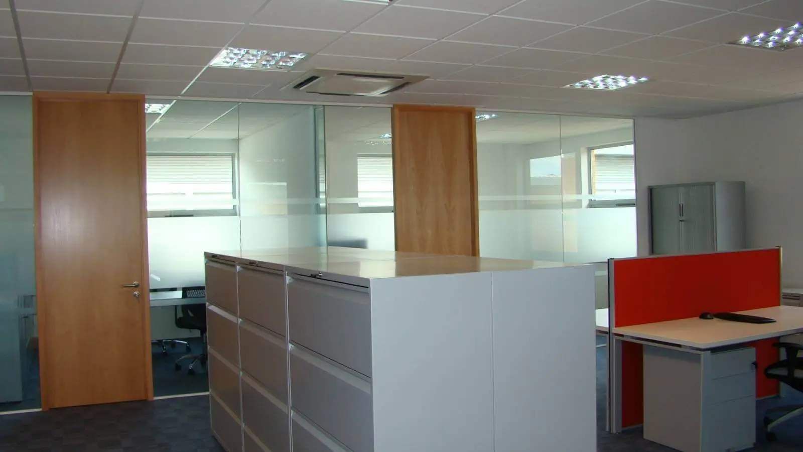 Brightstone Law firm with designer furniture, suspended grid ceiling, carpet tile flooring and glass partitions 6