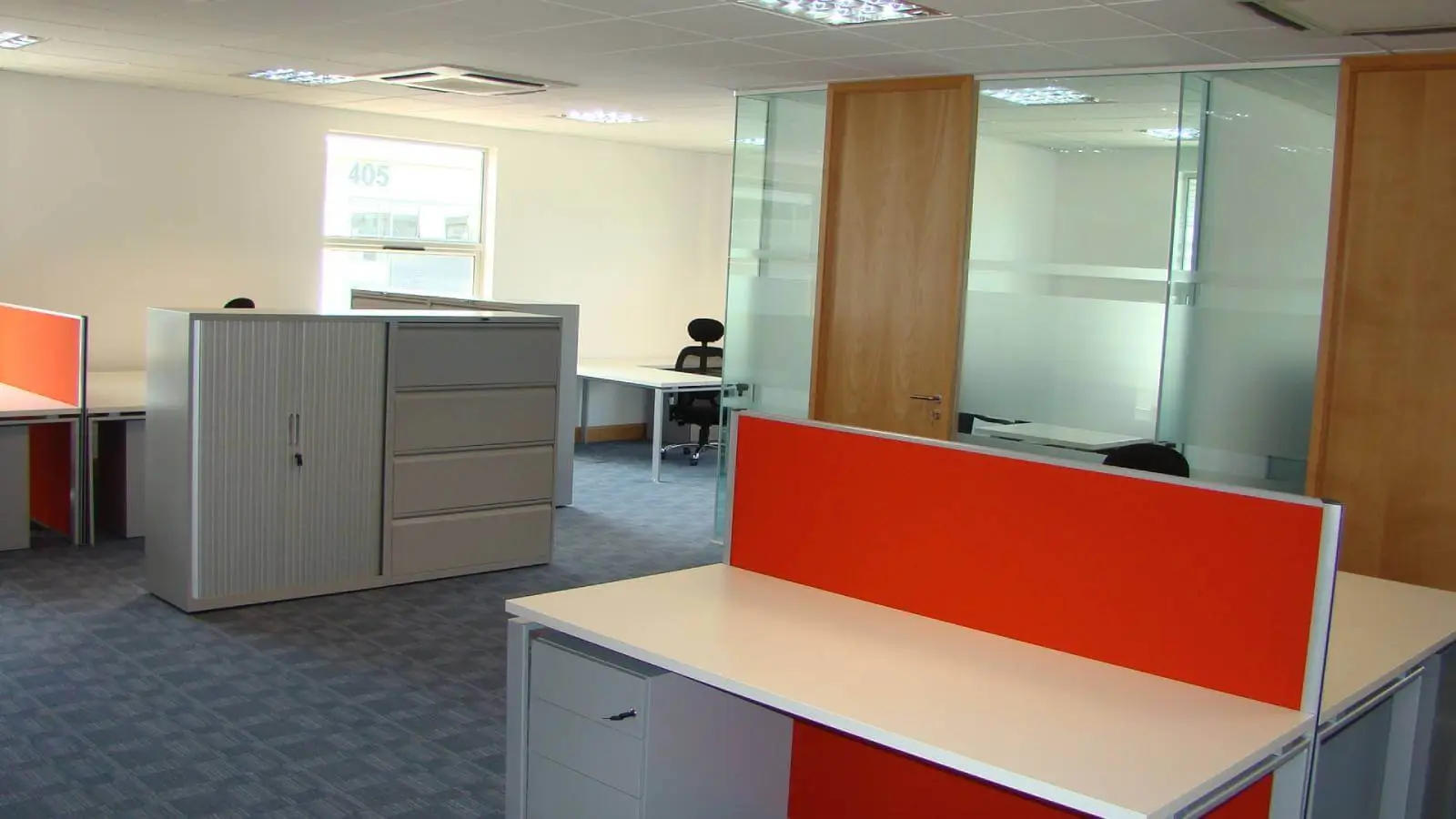 Brightstone Law firm with designer furniture, suspended grid ceiling, carpet tile flooring and glass partitions 8