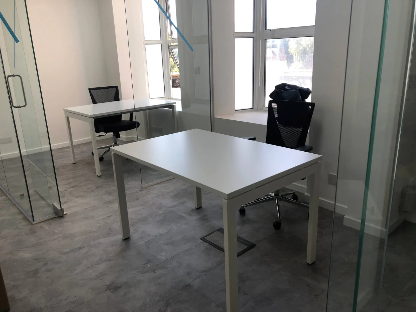 Buckingham Futures office with single glazed with frameless doors glass partitions and desinger furniture 1