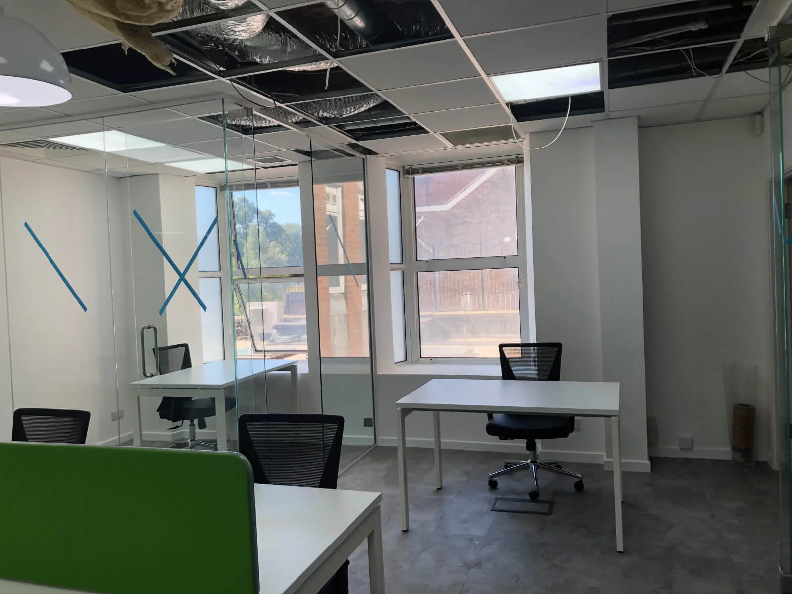 Buckingham Futures office with single glazed with frameless doors glass partitions and desinger furniture 9