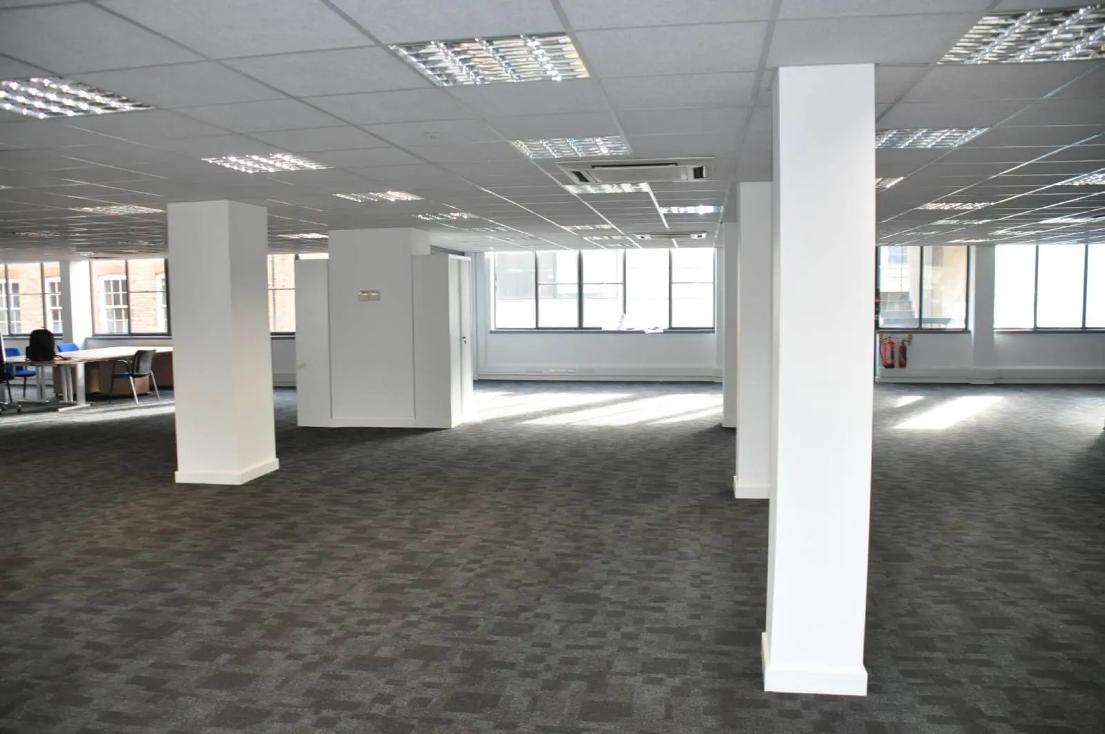 Business Cube Serviced offices with designer ceiling, flooring and glass partitions 2