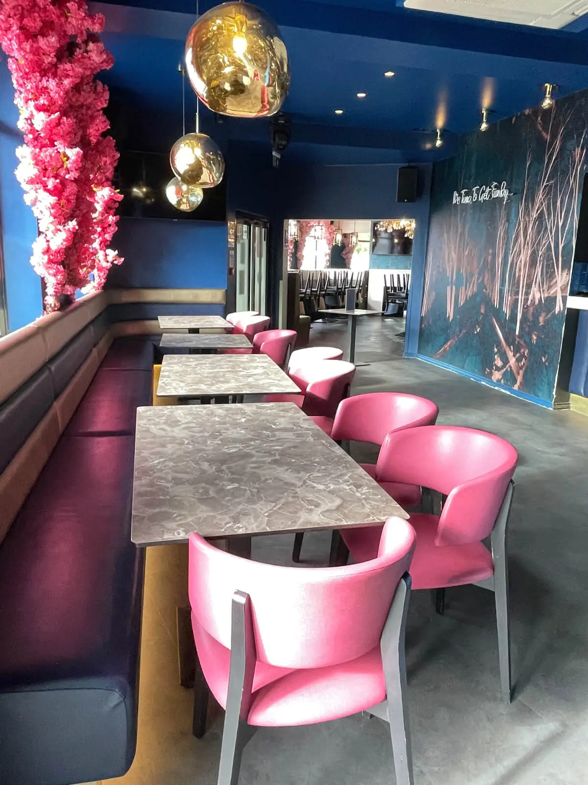 Cardamom Bar and Club with designer high tables, chairs, carpet tile flooring, and led lightings 16
