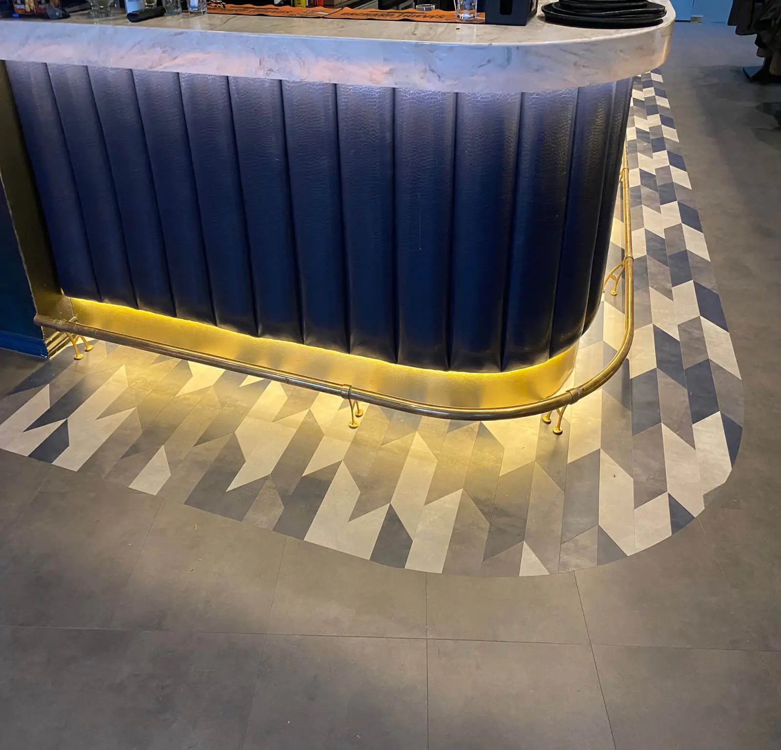 Cardamom Bar and Club with designer high tables, chairs, carpet tile flooring, and led lightings 31