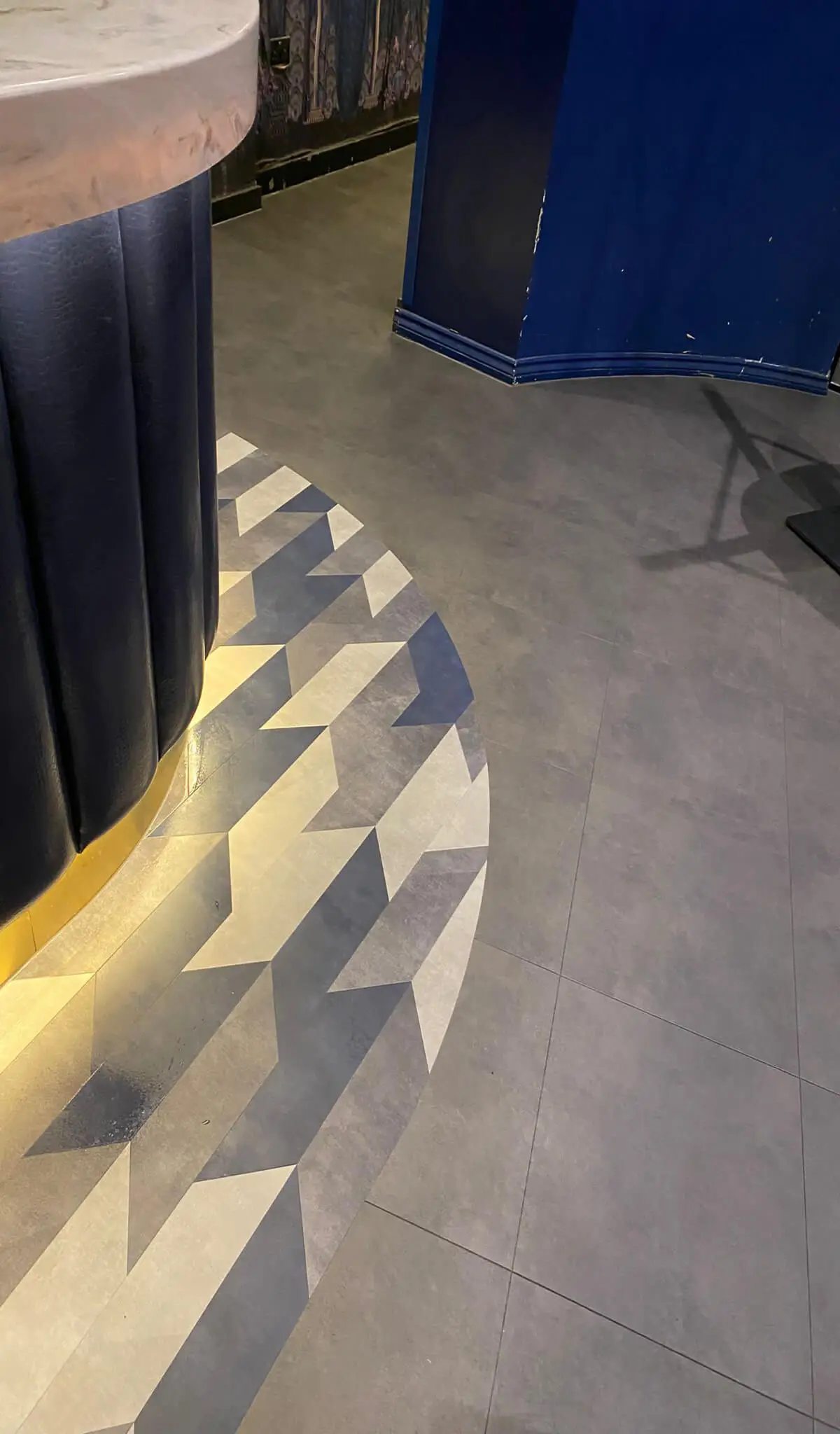 Cardamom Bar and Club with designer high tables, chairs, carpet tile flooring, and led lightings 37