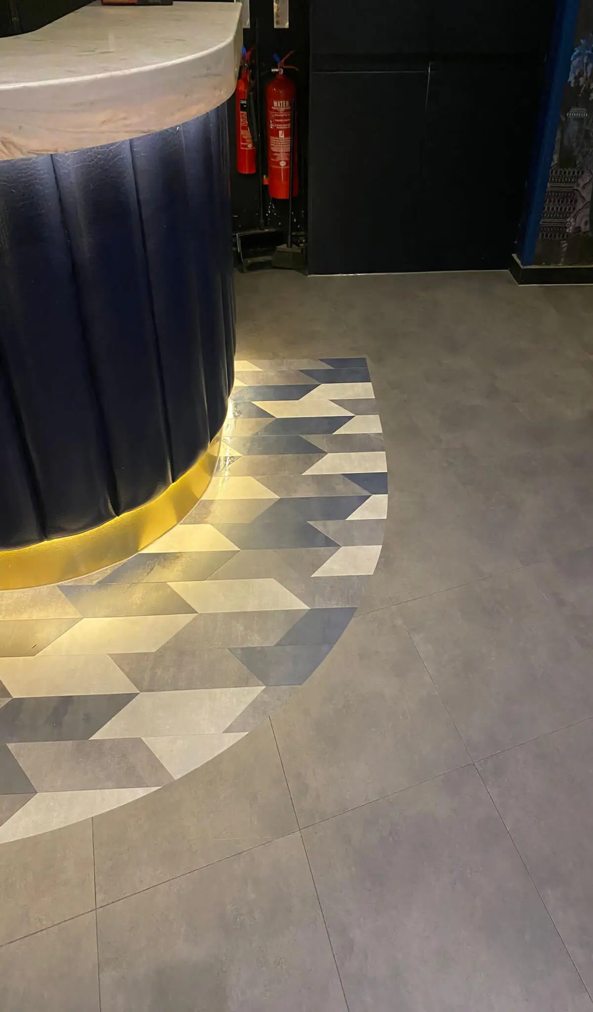 Cardamom Bar and Club with designer high tables, chairs, carpet tile flooring, and led lightings 39