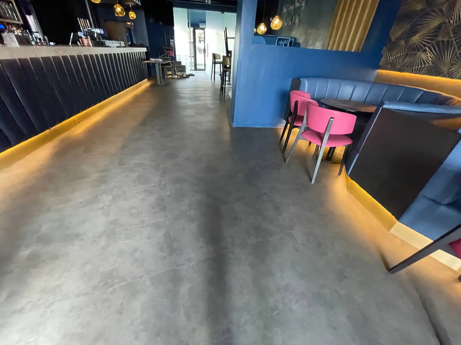 Cardamom Bar and Club with designer high tables, chairs, carpet tile flooring, and led lightings 8